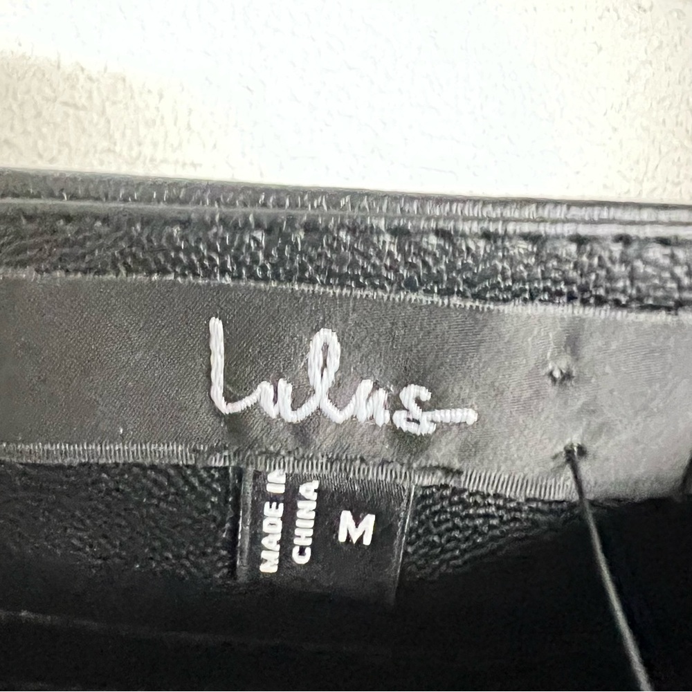 Lulu's Black Faux Leather Mini Skirt with Front Slit - Picture 3 of 3